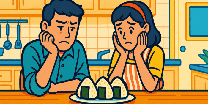 おにぎりを見ている男女